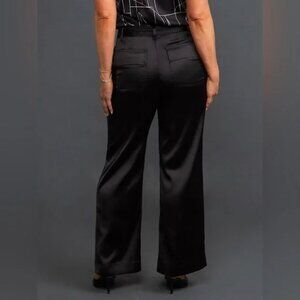 Bebe, size 4, Black Faux satin flared Pants